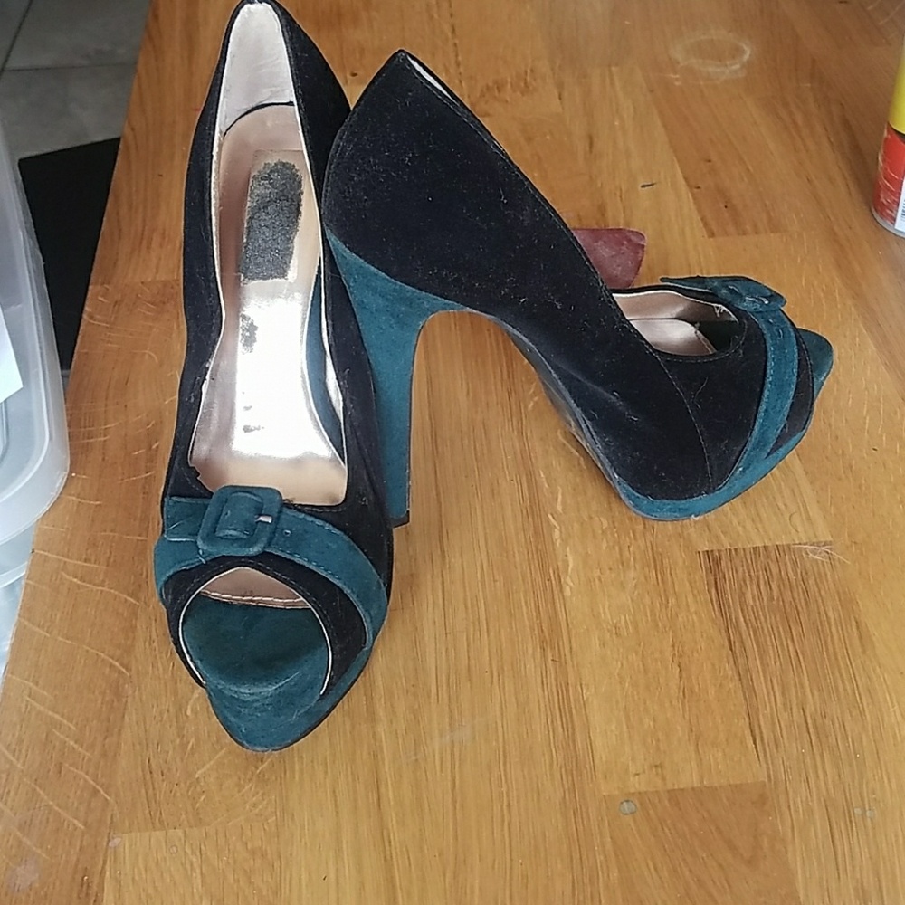 Black and green pumps